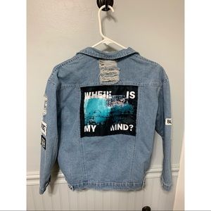 Vintage style jean jacket with patches